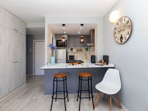 Fridge, microwave, toaster, cookware/dishes/utensils