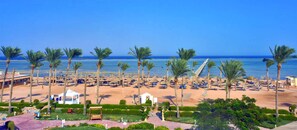 On the beach, sun-loungers, beach towels