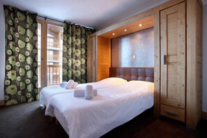 4 bedrooms, free WiFi, bed sheets - Wifi, 50m from resort center, fitness, swimming pool, sauna, hammam, balcony, tv, ski locker, 120m² (Les Arcs)
