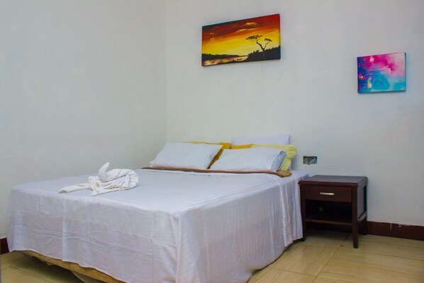 1 bedroom, desk, bed sheets