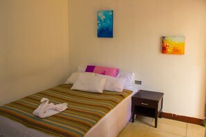 1 bedroom, desk, bed sheets