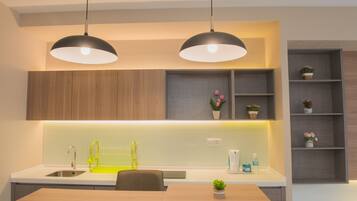 Fridge, electric kettle, cookware/dishes/utensils