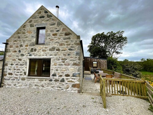 Two Bedroom large family cottage, sleeps up to seven,and has outdoor dining. 