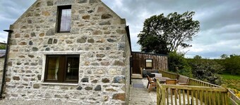 Two Bedroom large family cottage, sleeps up to seven,and has outdoor dining. 