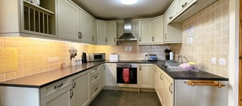Two Bedroom large family cottage, sleeps up to seven,and has outdoor dining.