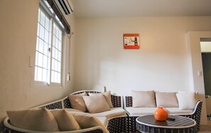 Villa Deluxe, 1 camera da letto | Area soggiorno | TV a schermo piatto