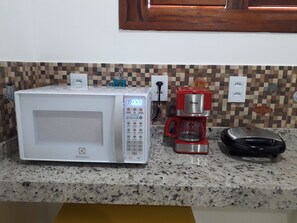 Microwave, coffee/tea maker, cookware/dishes/utensils