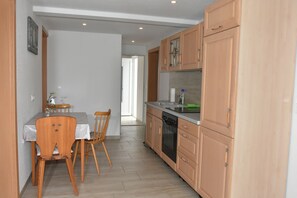 Fridge, stovetop, coffee/tea maker, electric kettle