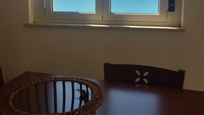 A dining area with a view of the ocean through a window. - Window to the Sea by Alexander 1p (Balestrate)