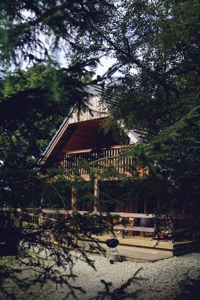 A cosy log cabin nestled in the woods. next to the river Deveron