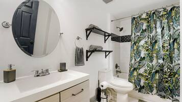 Bathtub, hair dryer, towels