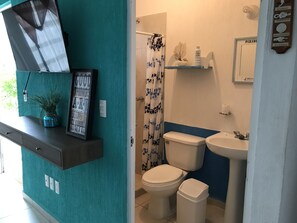 Bathtub, hair dryer, towels