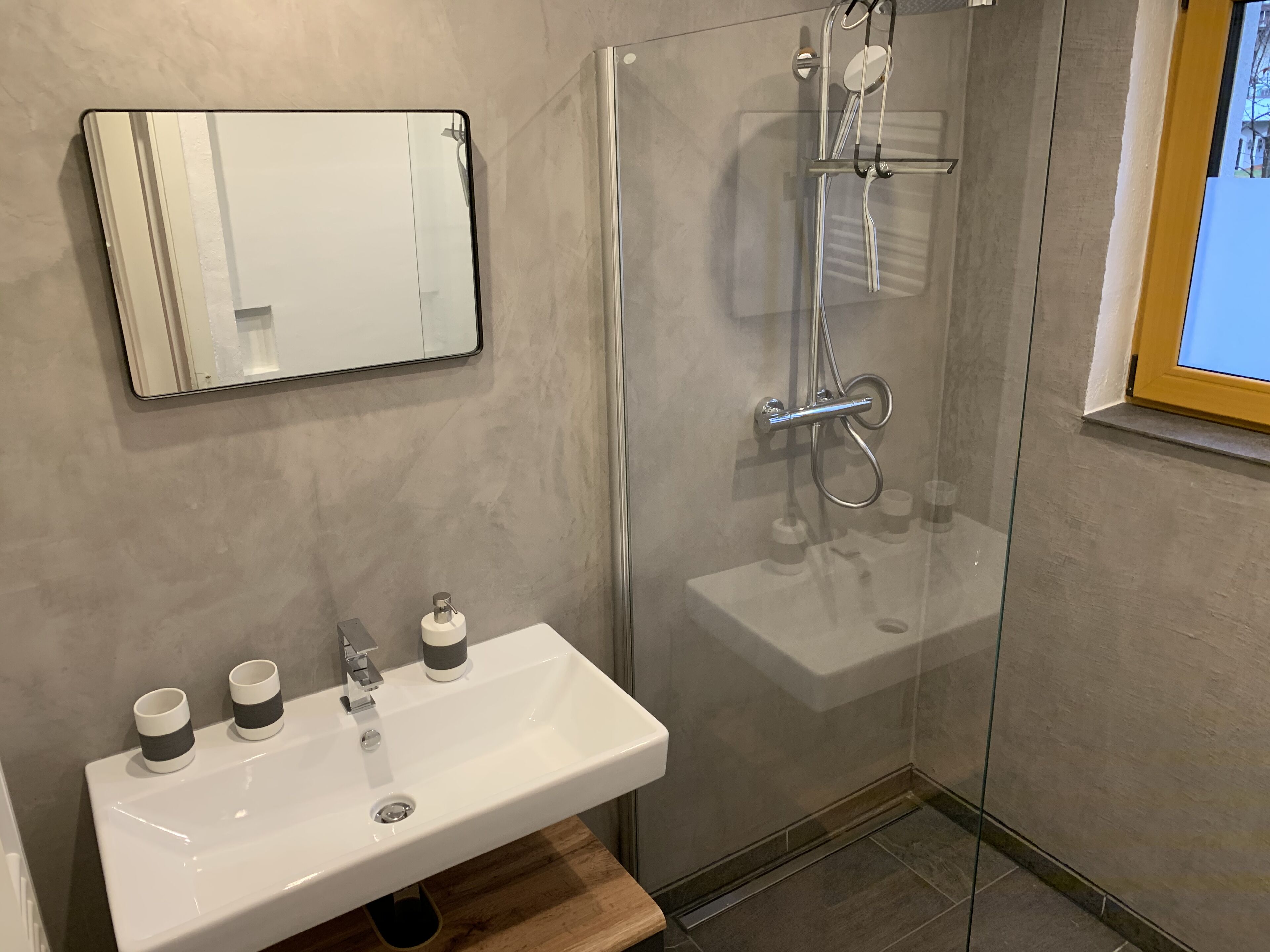 Combined shower/tub, hair dryer, towels, toilet paper
