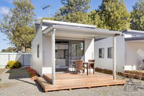 A modern, single-story house with a covered patio area. - Gawler Caravan Park (Willaston)