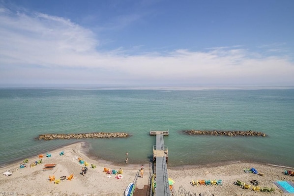 On the beach, sun loungers, beach towels