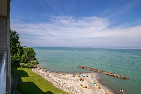 On the beach, sun-loungers, beach towels