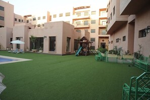 Children's area - Quiet stay - MARRAKECH : Apartment 87 m² SWIMMING POOL, FREE WIFI, PARKING (Marrakech)