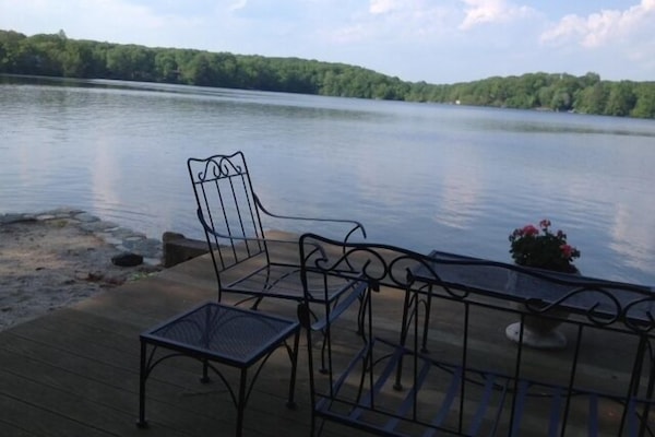 Water's edge deck with seating to enjoy the activity or tranquility!
