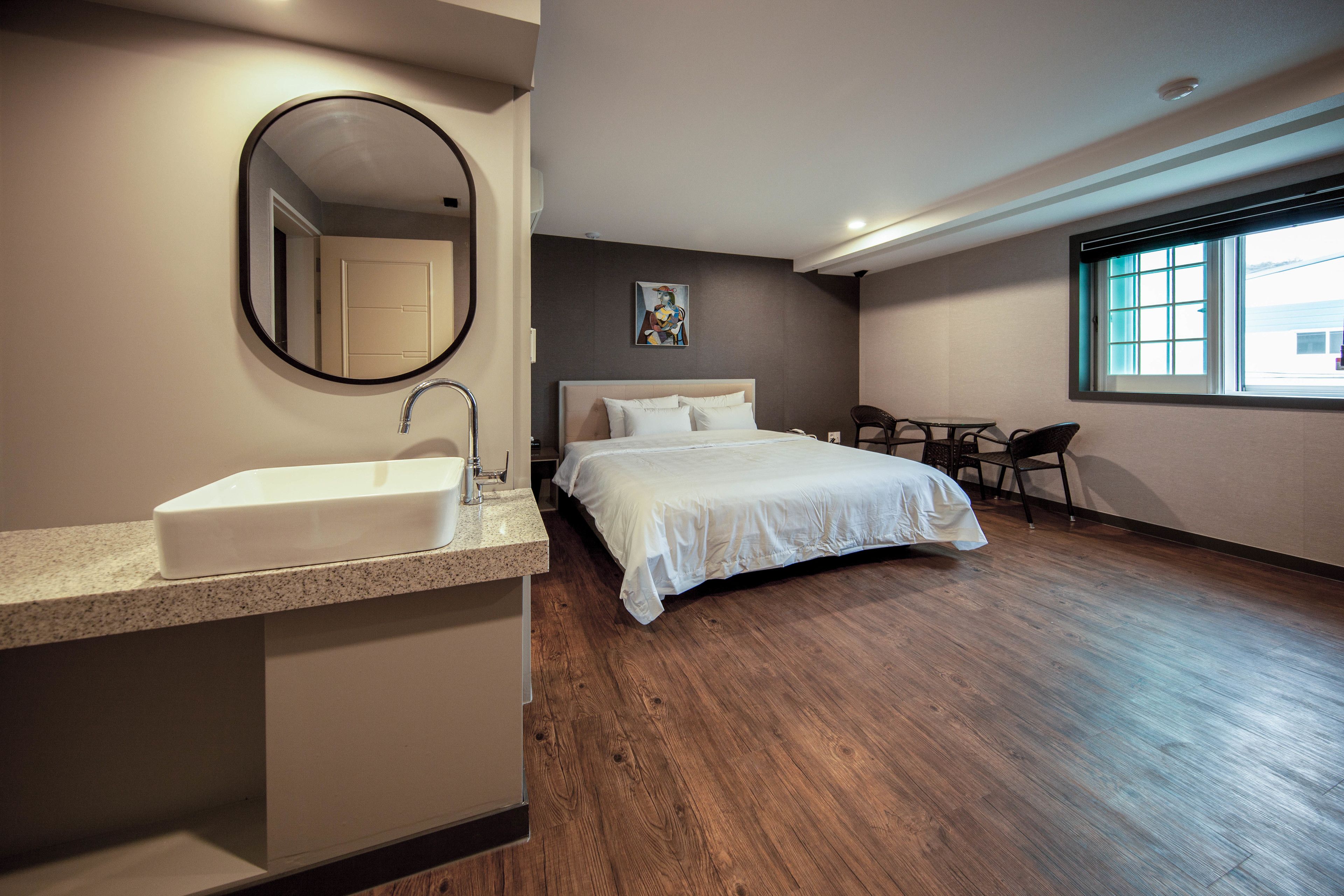 premium bedding, desk, laptop workspace, blackout curtains