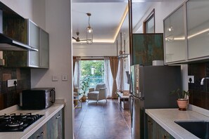 Fridge, microwave, oven, stovetop - The Jazminn - Metal apartment (Bangalore)