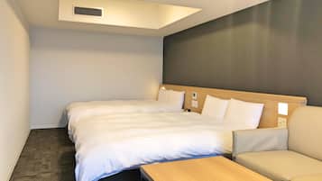 Premium bedding, down duvets, in-room safe, desk