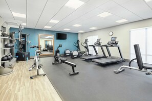 A gym with treadmills, weight machines, and exercise balls. - Hampton Inn Odessa Trinity (Trinity)