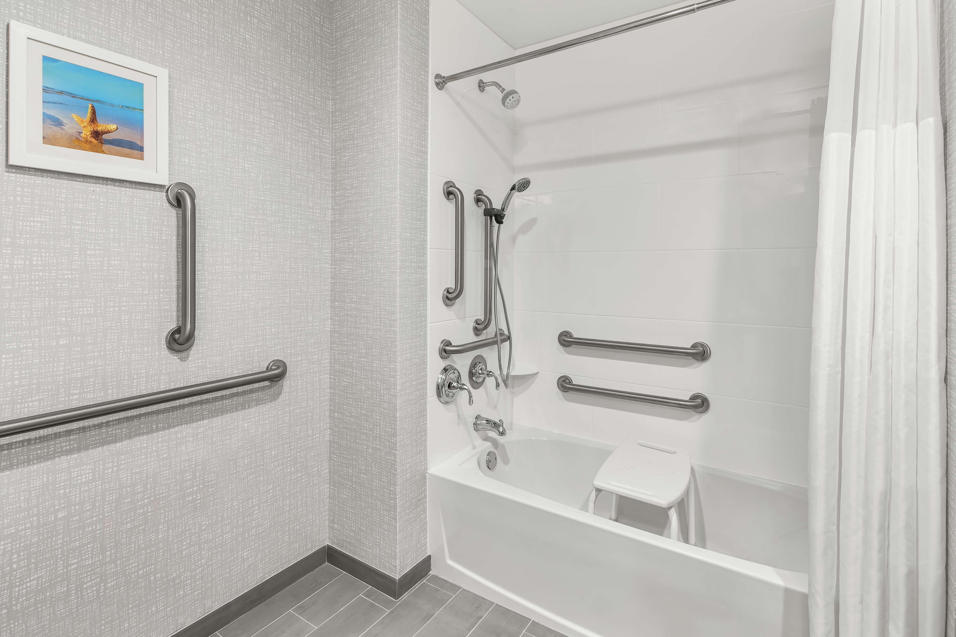 hydromassage showerhead, free toiletries, hair dryer, towels