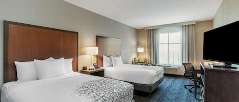 Desk, laptop workspace, blackout drapes, iron/ironing board