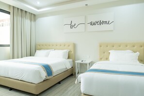 Family Quadruple Room | Premium bedding, memory foam beds, desk, laptop workspace - Hampton Suites (Davao)