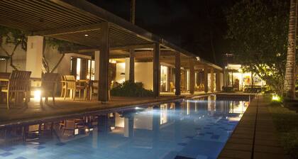 Beachfront villa with pool and full staff