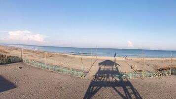 On the beach, beach cabanas, beach volleyball, beach bar