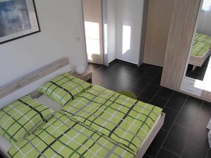 2 bedrooms, travel crib, WiFi, bed sheets