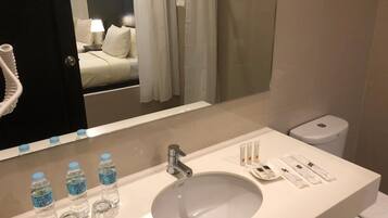 Shower, free toiletries, hair dryer, slippers