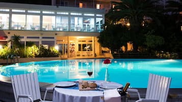 Seasonal outdoor pool, pool umbrellas, pool loungers