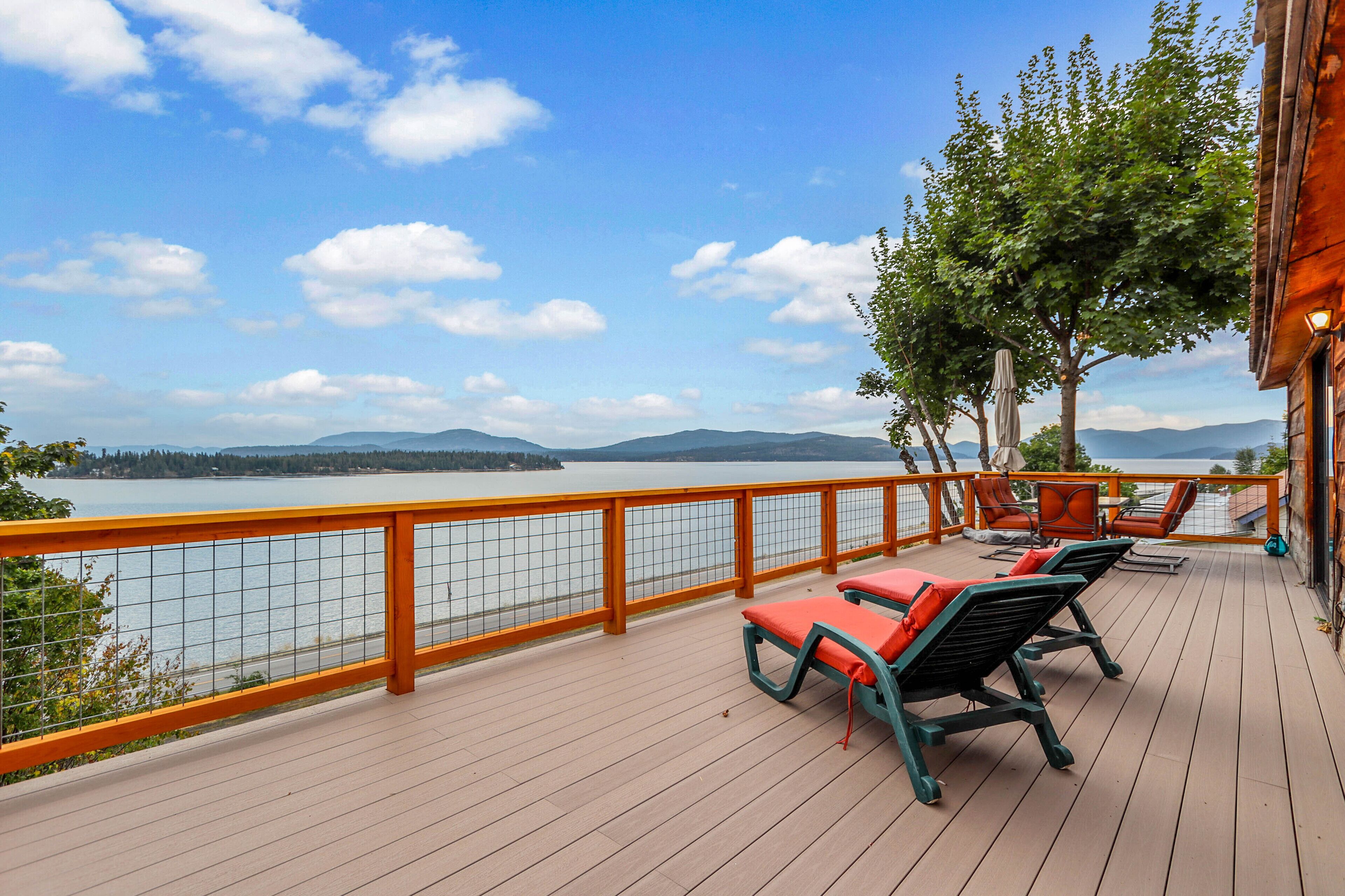 Rustic lakeview cabin w/gas grill, large deck, mountain views, W/D, wood stove