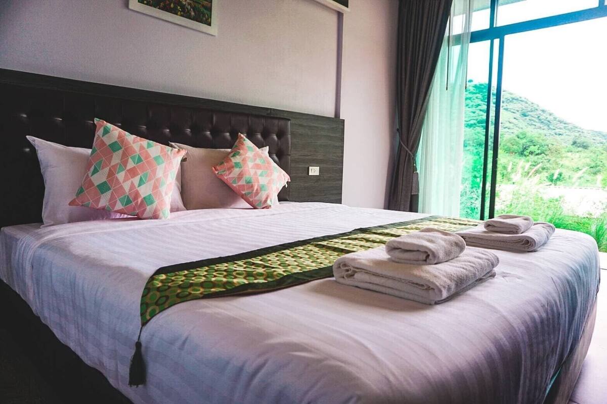 Desk, blackout curtains, soundproofing, rollaway beds