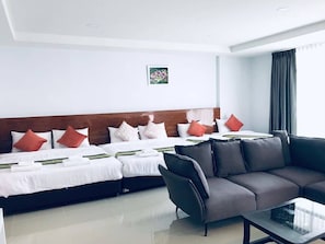 Desk, blackout curtains, soundproofing, rollaway beds