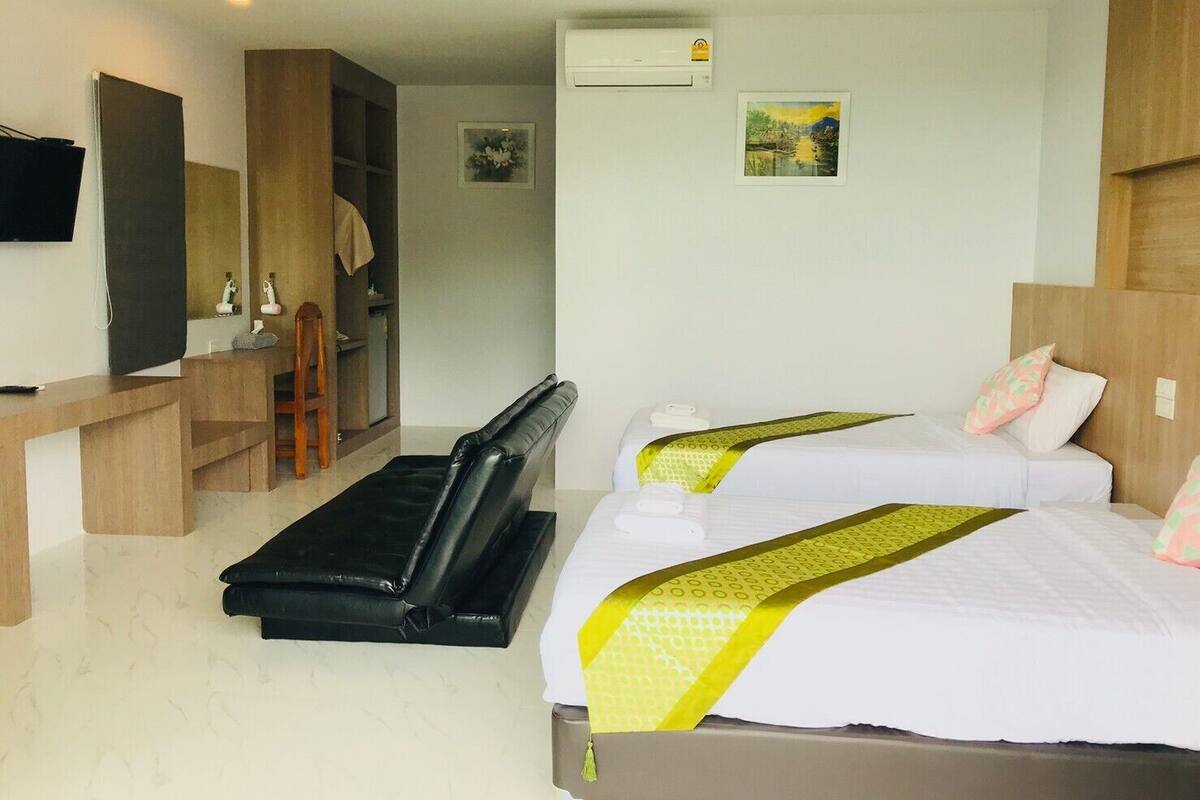 Desk, blackout curtains, soundproofing, rollaway beds