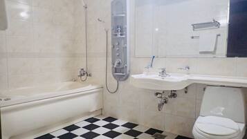 Combined shower/tub, free toiletries, hair dryer, bathrobes