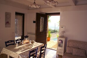 Appartement, 1 chambre (La Lavanda) | Coin séjour | Télévision à écran plat