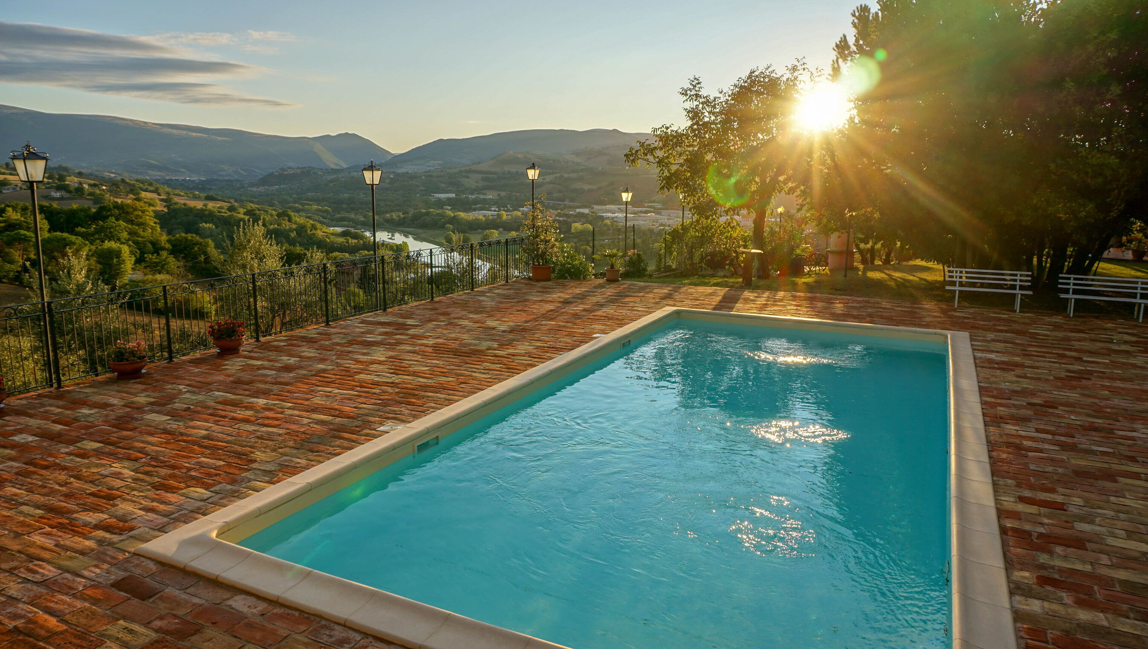 Seasonal outdoor pool, pool umbrellas, pool loungers