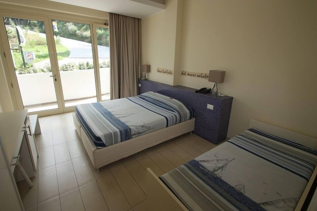 Comfort Triple Room, Ensuite, Sea View (Ballata Del Mare Salato) | Minibar, in-room safe, individually decorated, individually furnished