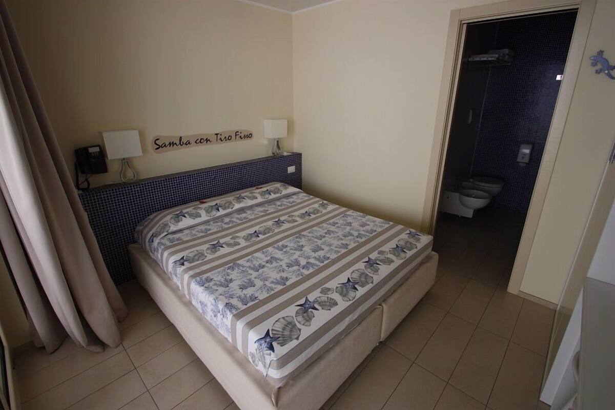 Basic Double or Twin Room (Samba con Tiro Fisso) | Minibar, in-room safe, individually decorated, individually furnished