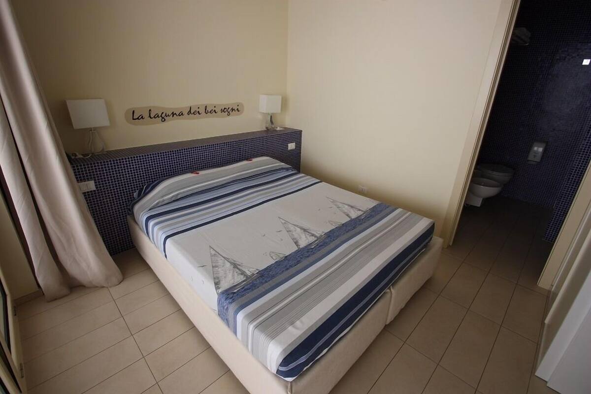 Basic Double or Twin Room (La Laguna dei Bei Sogni) | Minibar, in-room safe, individually decorated, individually furnished