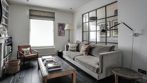 Apartment (3 Bedrooms) | Living area | TV - Masbro Road by Onefinestay (London)