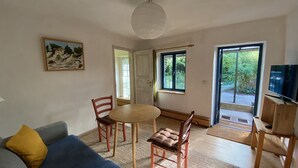 Living area - Cozy apartment with colored clay plaster, forest-quiet site (Prerow)