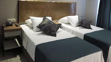 Ropa de cama de alta calidad y minibar