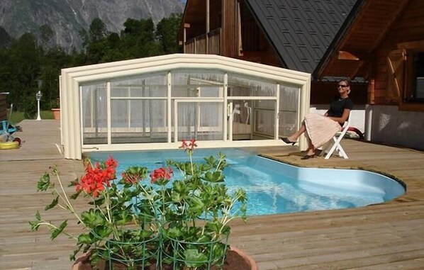 Alberca techada y alberca climatizada