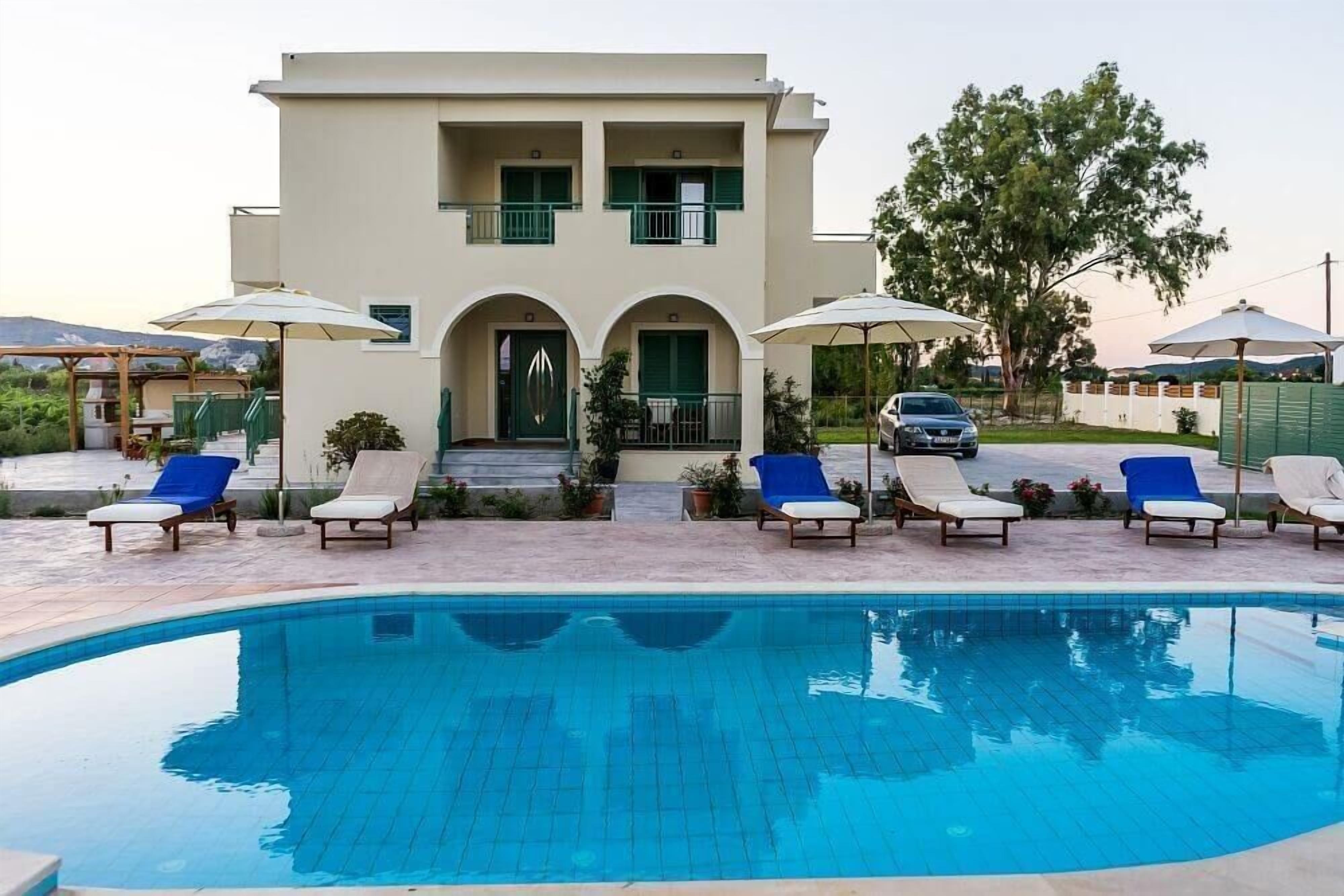 Seasonal outdoor pool, pool umbrellas, sun loungers