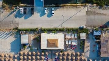 Private beach, white sand, sun-loungers, beach umbrellas